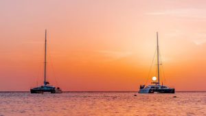 Enjoy a sunset cruise on a modern catamaran