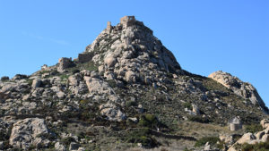 The small chapels and towers in the rocky backdrop