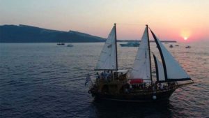 Main photo for Santorini's Experience: Caldera and Oia's Breathtaking Sunset with a Wooden Sailling Boat Trip