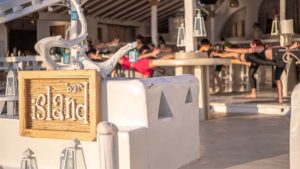 Immerse yourself in a captivating ambiance at Island Bar, overlooking Agia Anna Beach